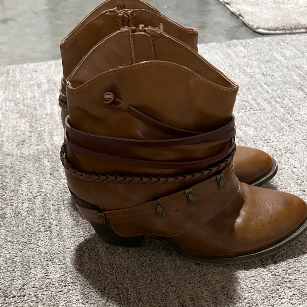 Cute ankle fashion boots. Used, but not worn much. Have been sitting in closet.